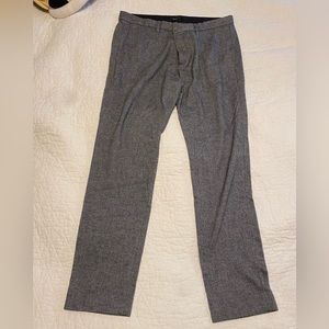 These pair of pants are from Theory. Size 36 American fits more like a 34-35 W.